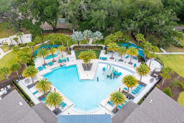 a view of swimming pool with a patio