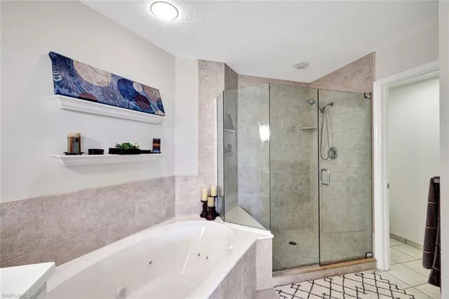 a bedroom with two beds and a window