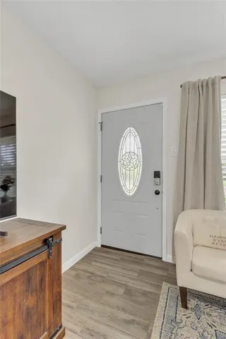 a front view of a house with sitting area