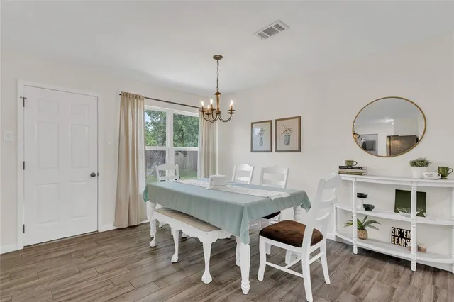 a bed room with bed and window