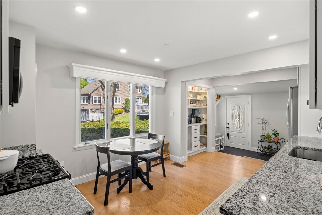 76 Perkins Street Stoneham, MA 02180 - Photo 16 of 40 a workspace with furniture and window