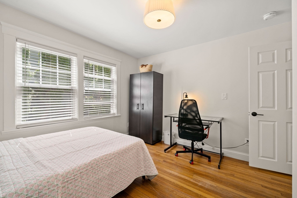 76 Perkins Street Stoneham, MA 02180 - Photo 21 of 40 a bedroom with a bed and a window