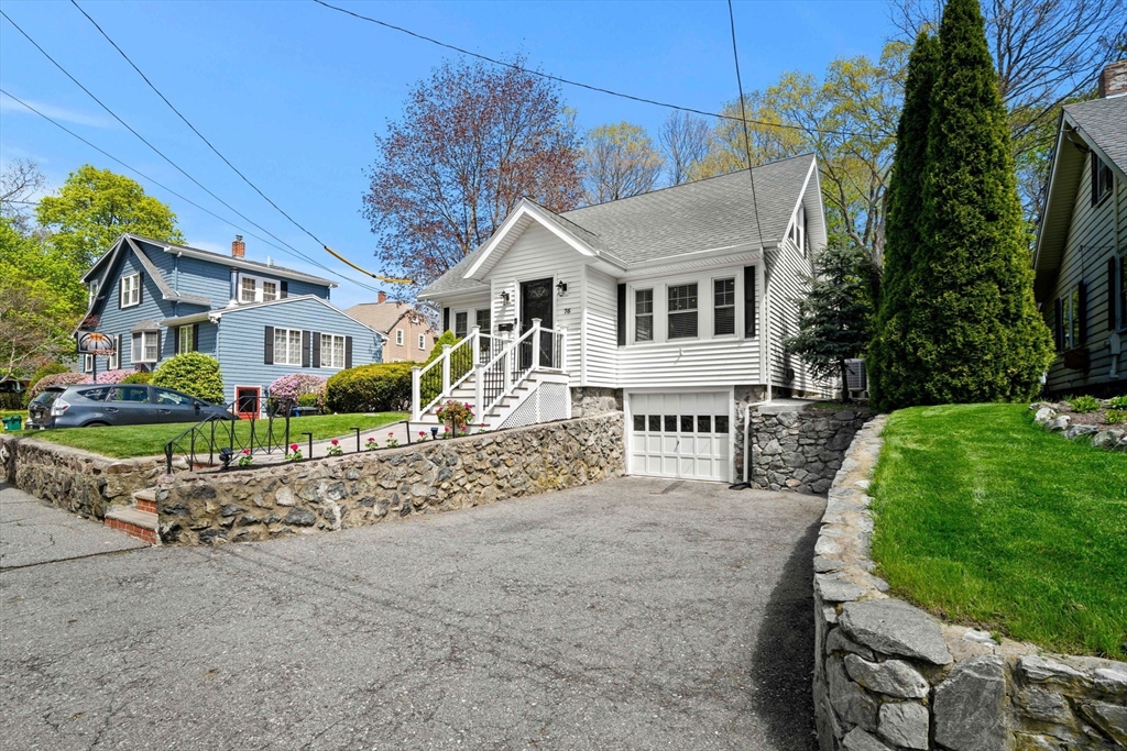 76 Perkins Street Stoneham, MA 02180 - Photo 3 of 40 a house that has a tree in front of it