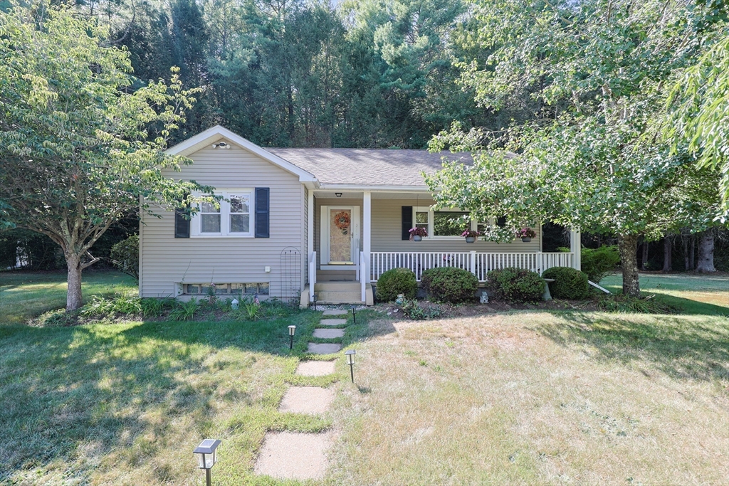 500 Worcester Road Barre, MA 01005 - Photo 1 of 24 a front view of a house with a yard