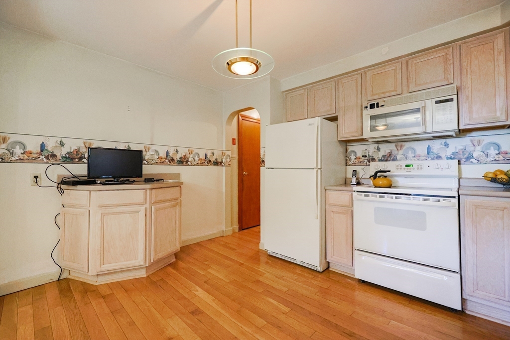 500 Worcester Road Barre, MA 01005 - Photo 12 of 24 a kitchen with a refrigerator sink and cabinets