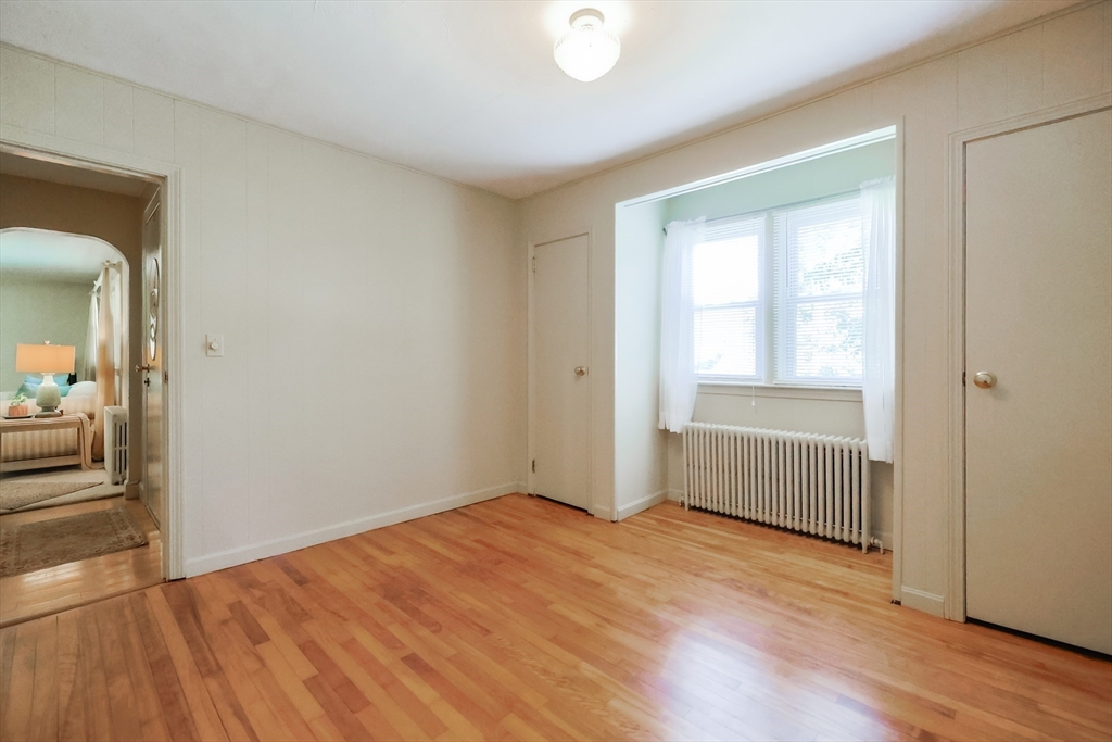 500 Worcester Road Barre, MA 01005 - Photo 14 of 24 a view of a room with wooden floor and a bathroom