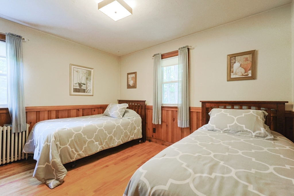 500 Worcester Road Barre, MA 01005 - Photo 16 of 24 a bedroom with two beds and painting on the wall