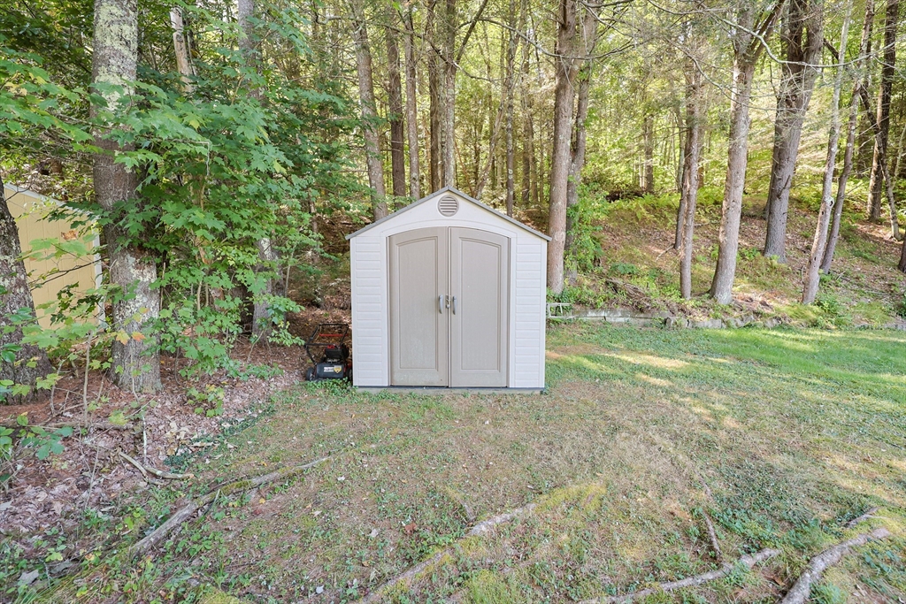 500 Worcester Road Barre, MA 01005 - Photo 22 of 24 a view of a house with backyard and trees