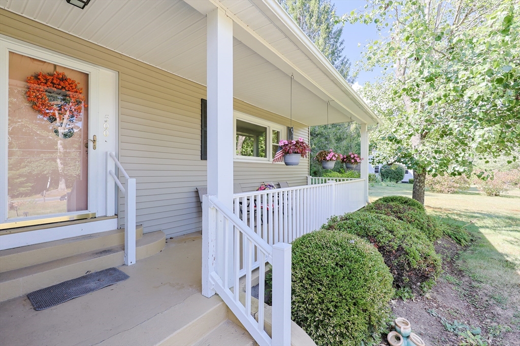 500 Worcester Road Barre, MA 01005 - Photo 3 of 24 a view of a porch with a bench