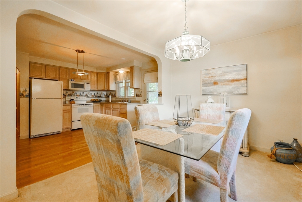 500 Worcester Road Barre, MA 01005 - Photo 8 of 24 a view of a dining room with furniture and chandelier
