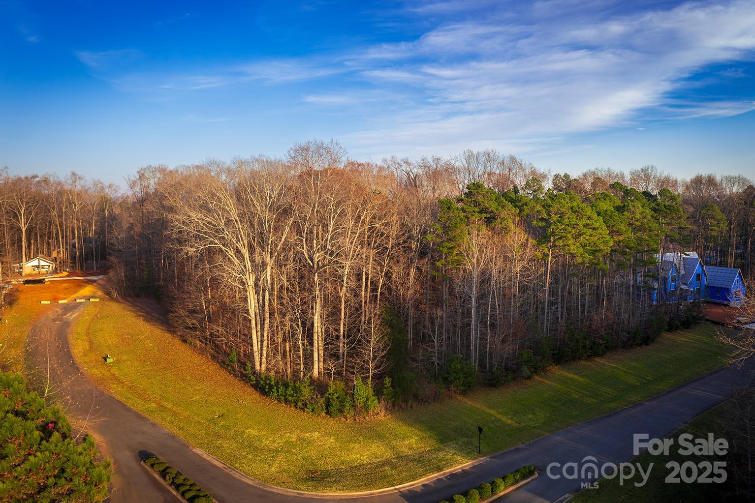12804 Early Meadow Way, Unit 11 Mint Hill, NC 28227 - Photo 2 of 3 a view of a swimming pool with a yard