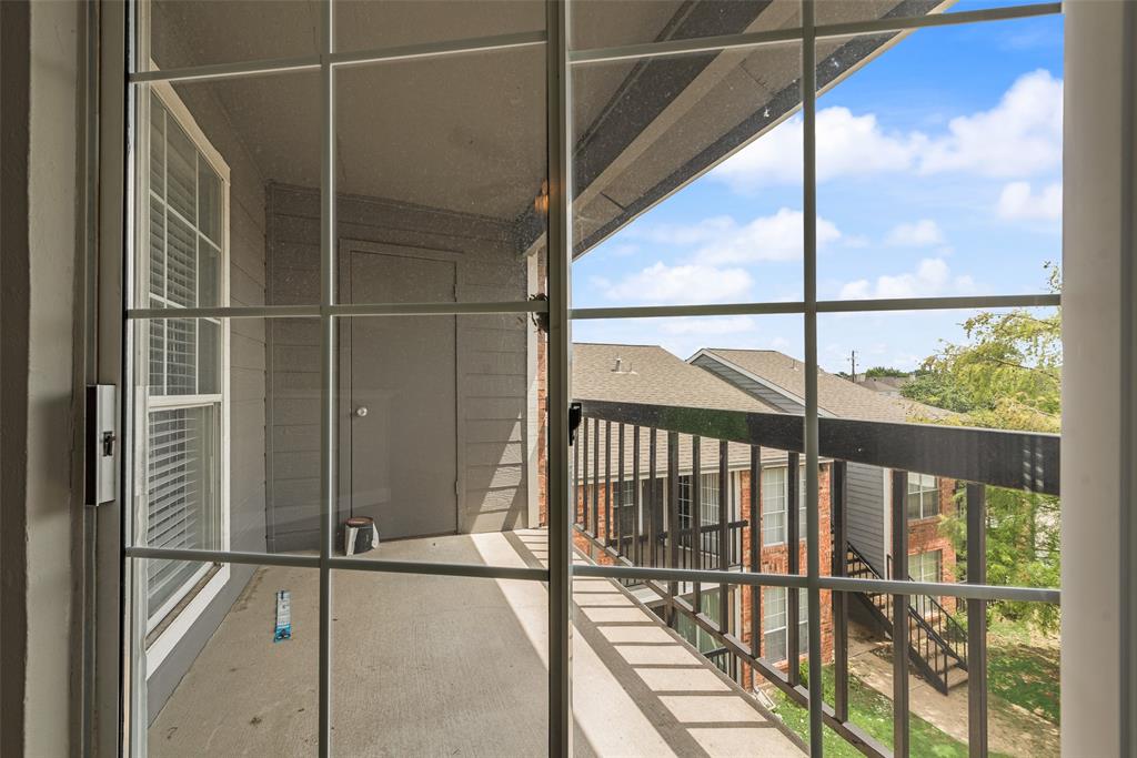 18333 Roehampton Drive, Unit 1037 Dallas, TX 75252 - Photo 16 of 20 View of your Covered Patio through your glass sliding door!