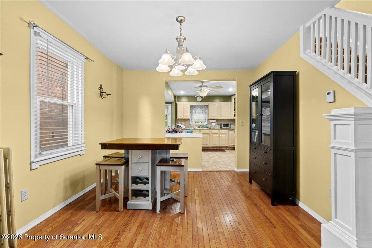 607 Deacon Street Scranton, PA 18509 - Photo 17 of 40 a view of a dining room with furniture window and wooden floor