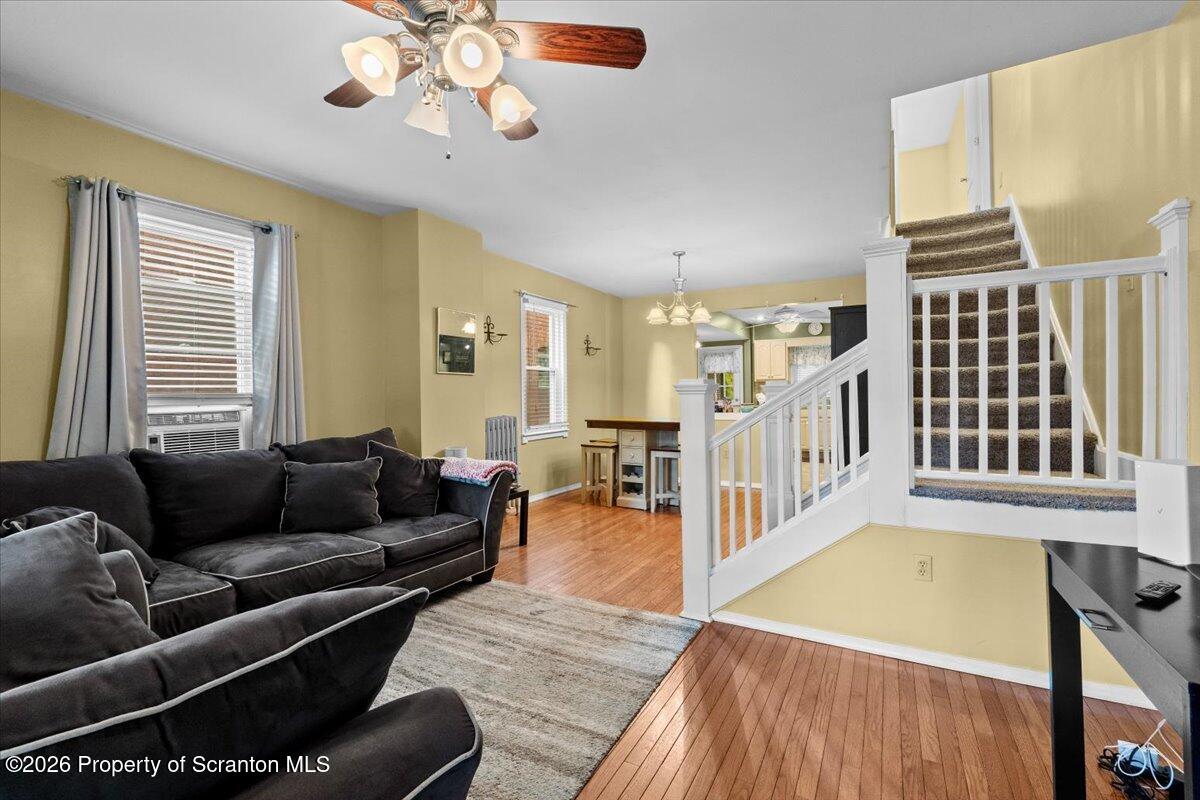 607 Deacon Street Scranton, PA 18509 - Photo 18 of 40 a living room with furniture and a dining table