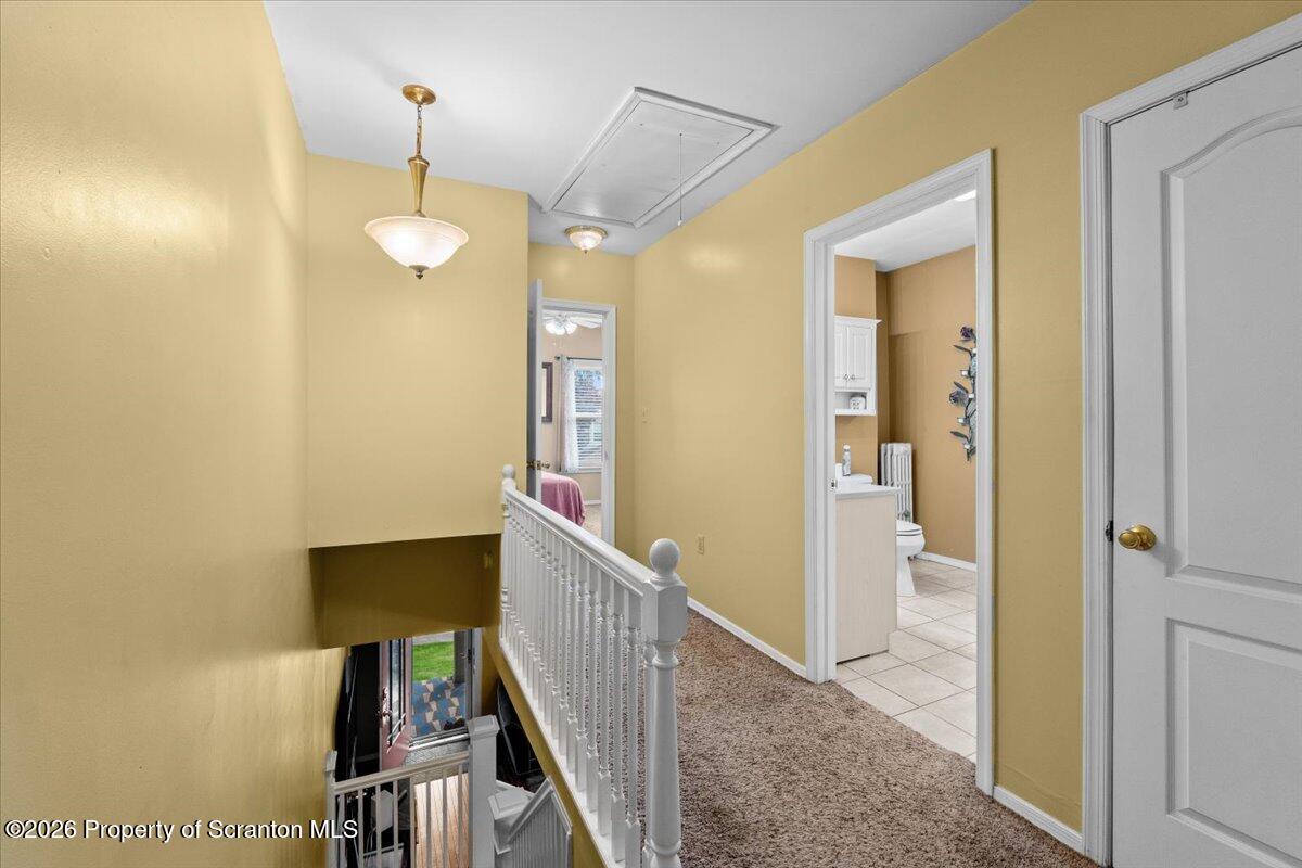 607 Deacon Street Scranton, PA 18509 - Photo 19 of 40 a view of a hallway with a room