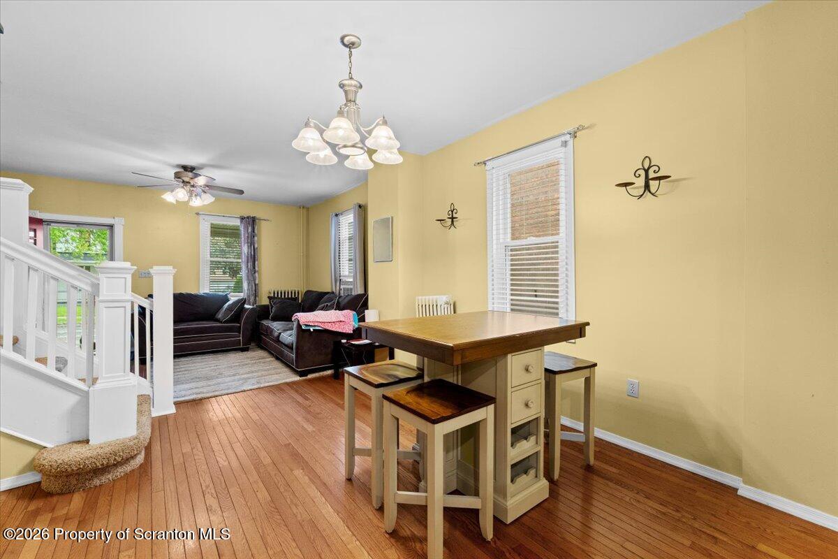 607 Deacon Street Scranton, PA 18509 - Photo 24 of 40 a living room with fireplace furniture and a wooden floor