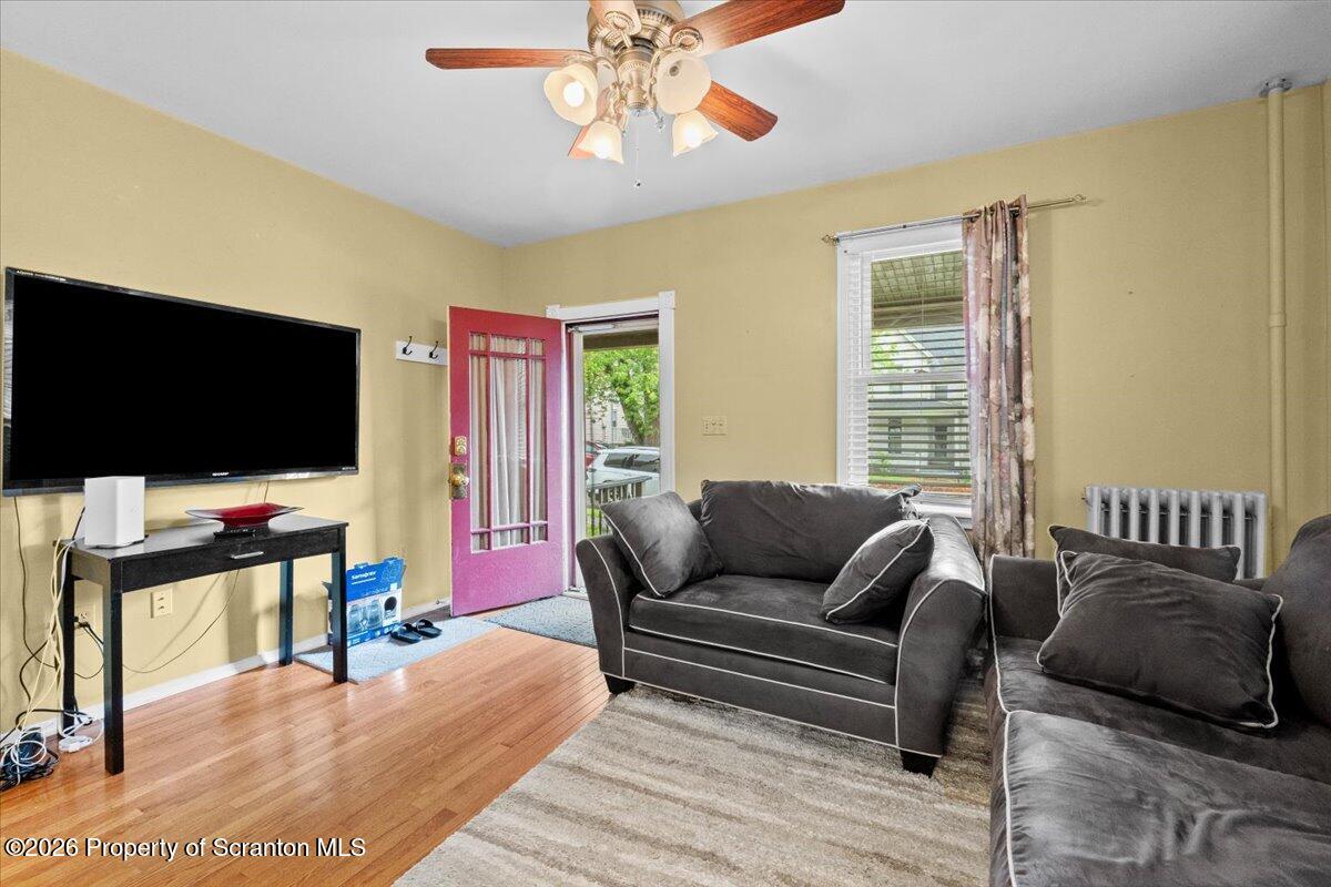 607 Deacon Street Scranton, PA 18509 - Photo 25 of 40 a living room with furniture and a flat screen tv