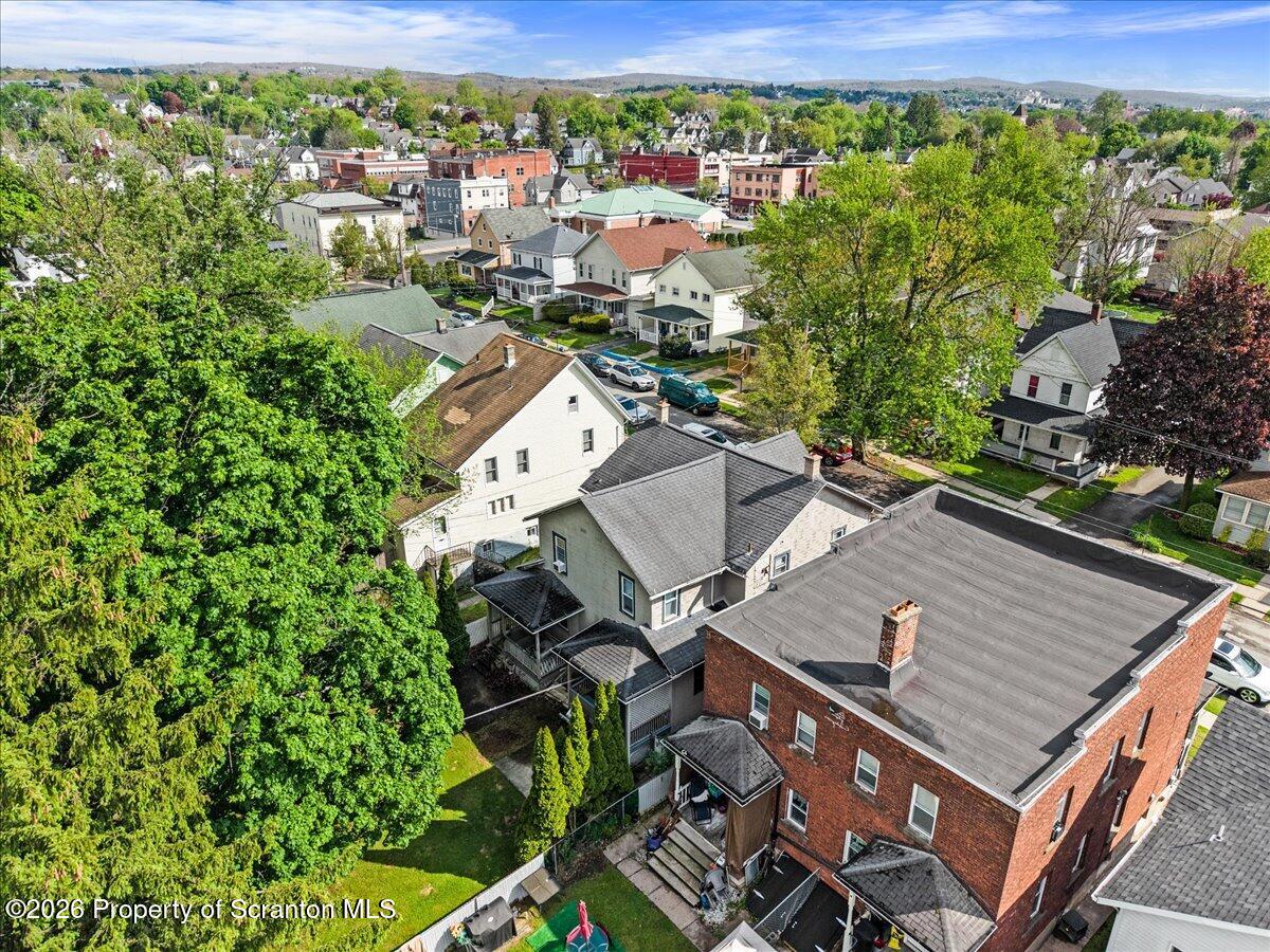 607 Deacon Street Scranton, PA 18509 - Photo 38 of 40 an aerial view of a house with a yard