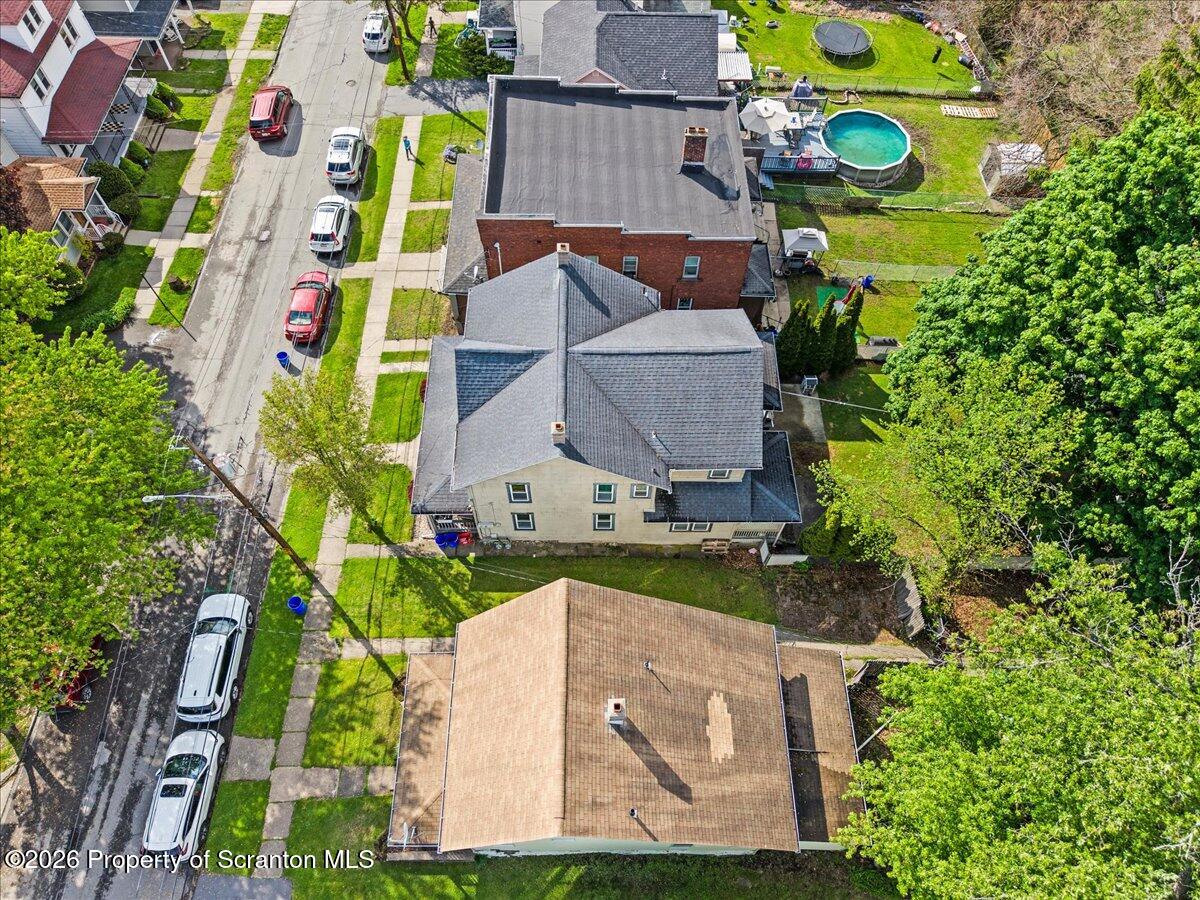 607 Deacon Street Scranton, PA 18509 - Photo 40 of 40 an aerial view of house with yard swimming pool and outdoor seating