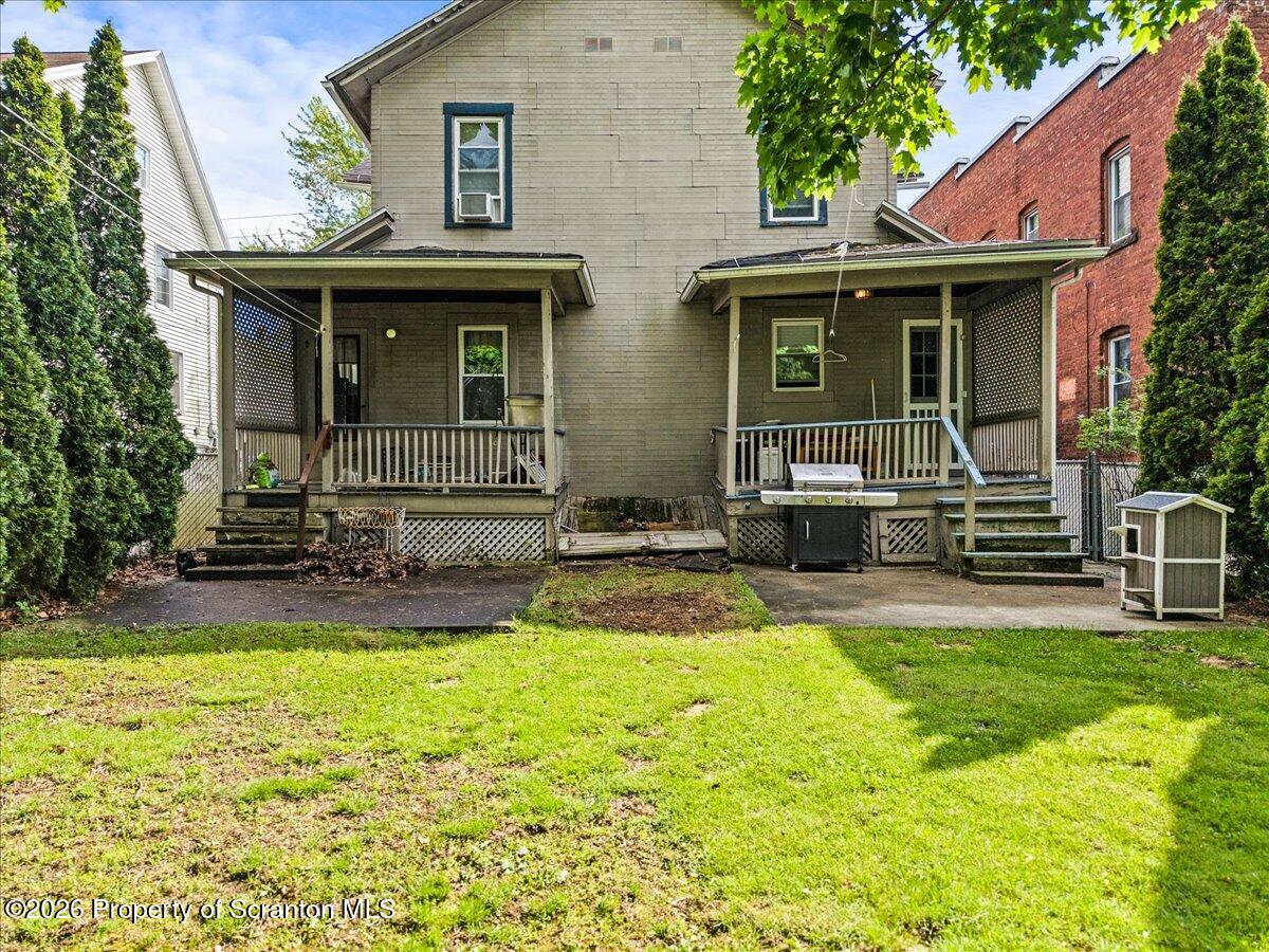 607 Deacon Street Scranton, PA 18509 - Photo 4 of 40 front view of a house with a yard