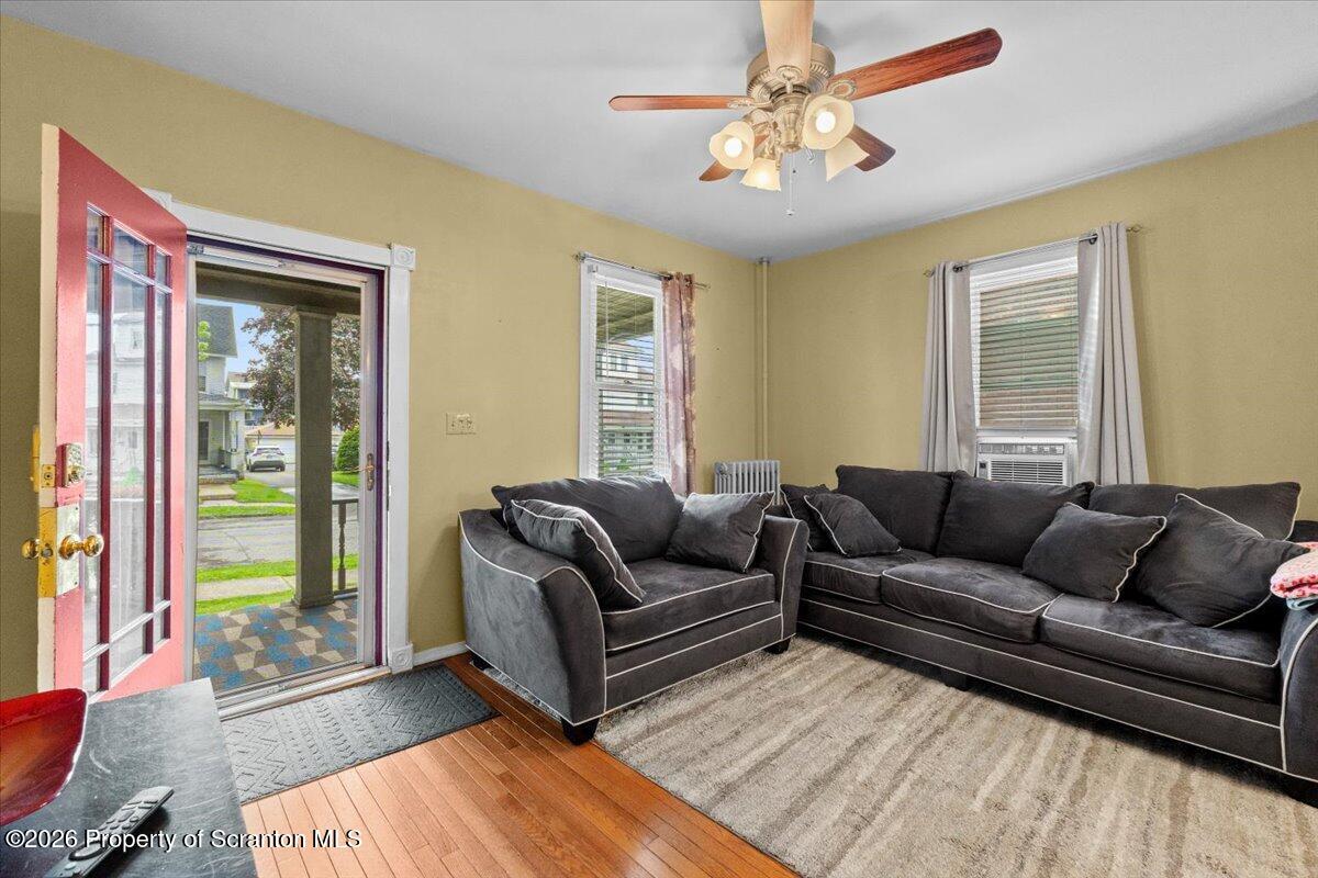 607 Deacon Street Scranton, PA 18509 - Photo 7 of 40 a living room with furniture and a large window