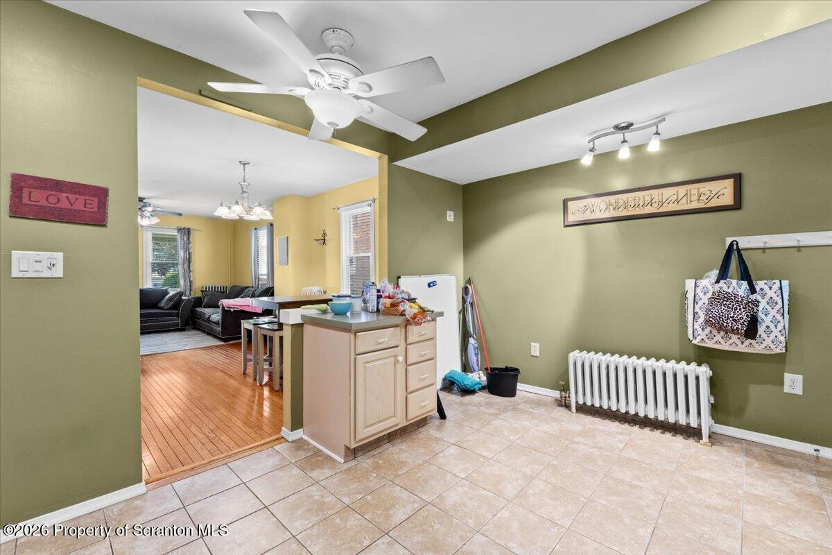 607 Deacon Street Scranton, PA 18509 - Photo 8 of 40 a view of a hallway with workspace and a window
