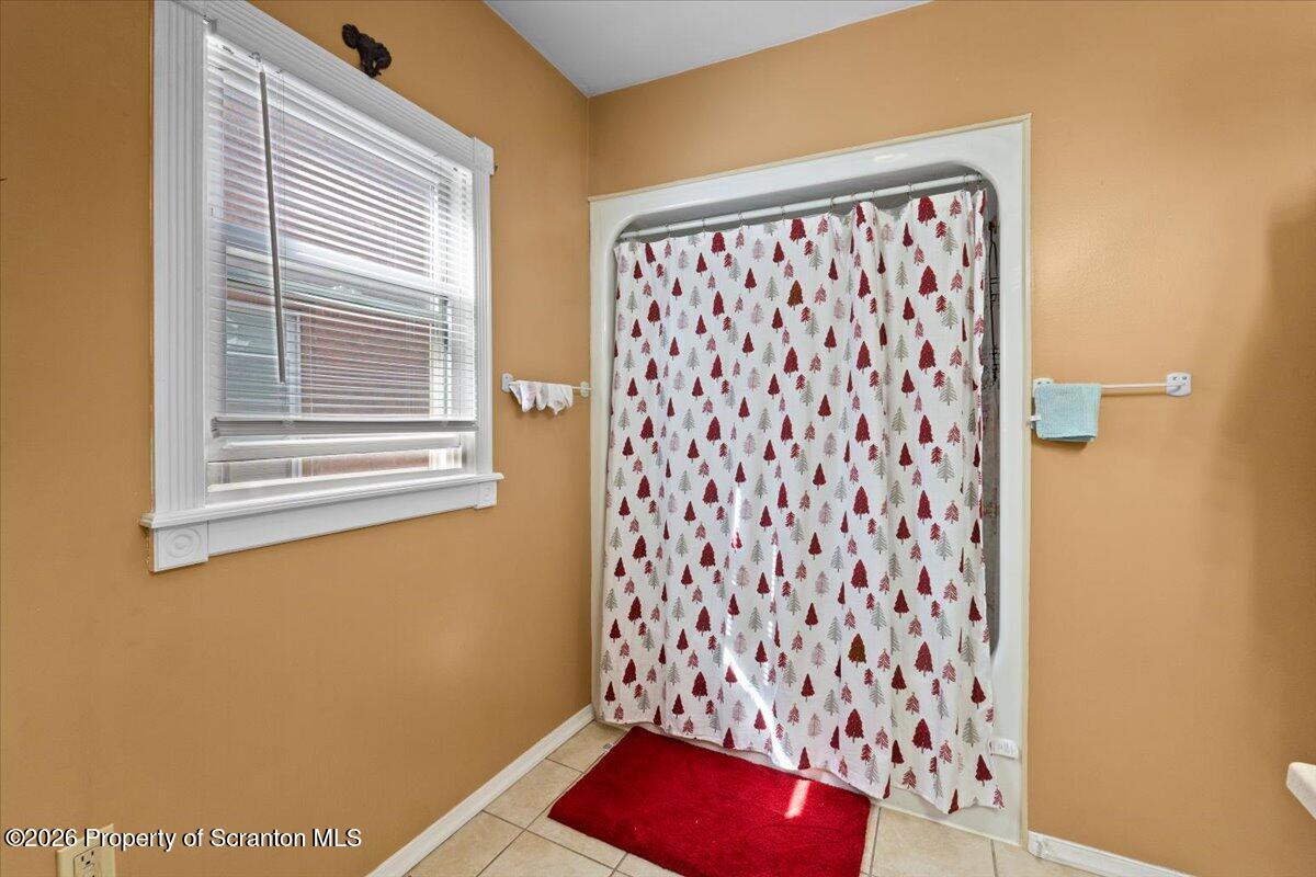607 Deacon Street Scranton, PA 18509 - Photo 10 of 40 a view of a door and chair