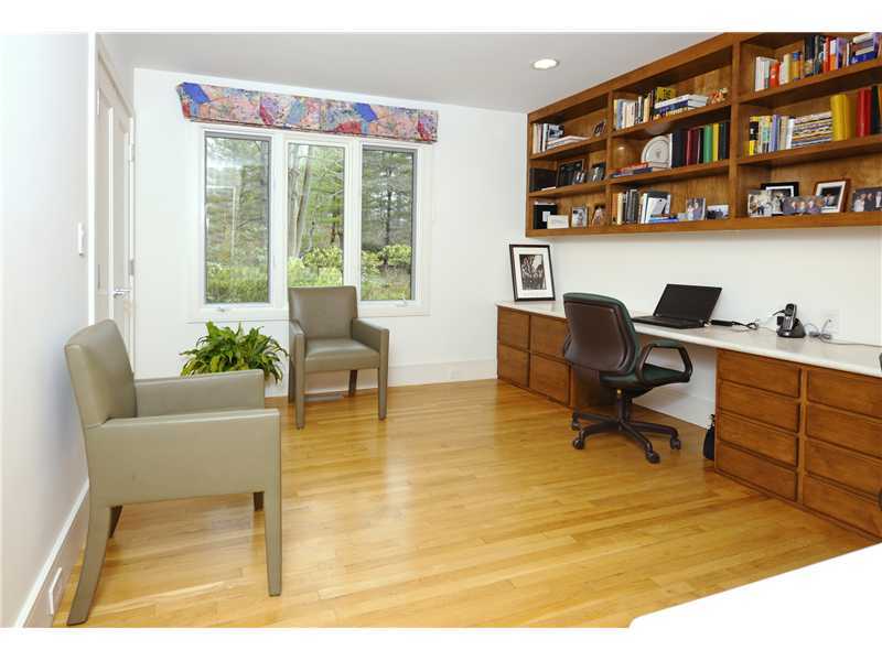21 Mountain Wood Drive Greenwich, CT 06830 - Photo 15 of 20 a view of a workspace with furniture and a window