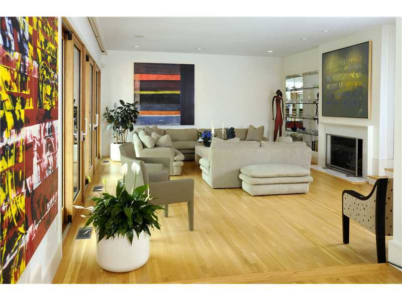 21 Mountain Wood Drive Greenwich, CT 06830 - Photo 3 of 20 a living room with furniture and a potted plant