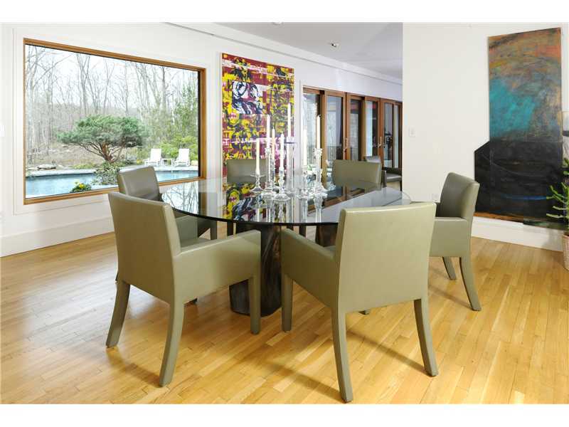 21 Mountain Wood Drive Greenwich, CT 06830 - Photo 5 of 20 a dining room with furniture and large windows