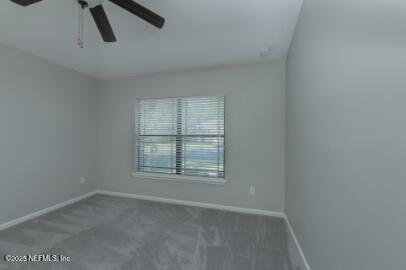 86192 Fortune Drive Yulee, FL 32097 - Photo 23 of 33 an empty room with a window
