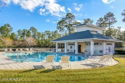 86192 Fortune Drive Yulee, FL 32097 - Photo 3 of 33 a house view with swimming pool and outdoor space