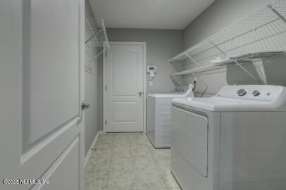 86192 Fortune Drive Yulee, FL 32097 - Photo 32 of 33 a utility room with dryer and washer