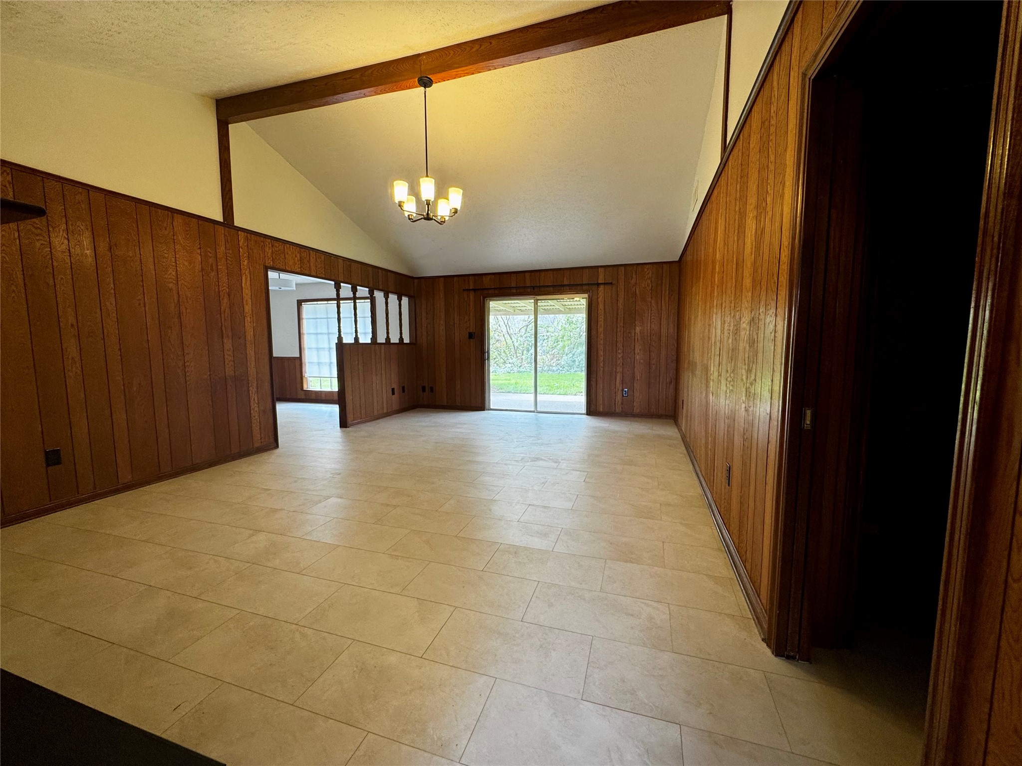 24231 Shellbrook Drive Houston, TX 77336 - Photo 3 of 42 a view of a hallway with a chandelier