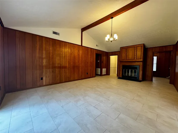 a living room with a fireplace