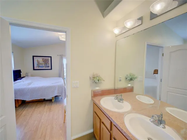 a view of a bedroom with a bed