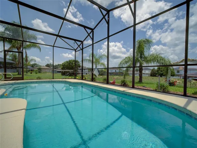 a room with cabinets and chandelier