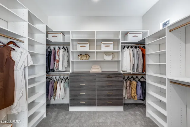 a view of a swimming pool with a lounge chairs