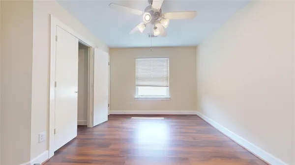 a view of an empty room and window