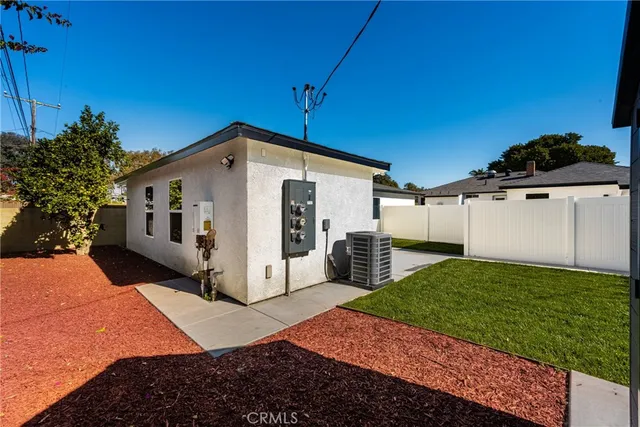 a kitchen with stainless steel appliances a refrigerator sink and cabinets