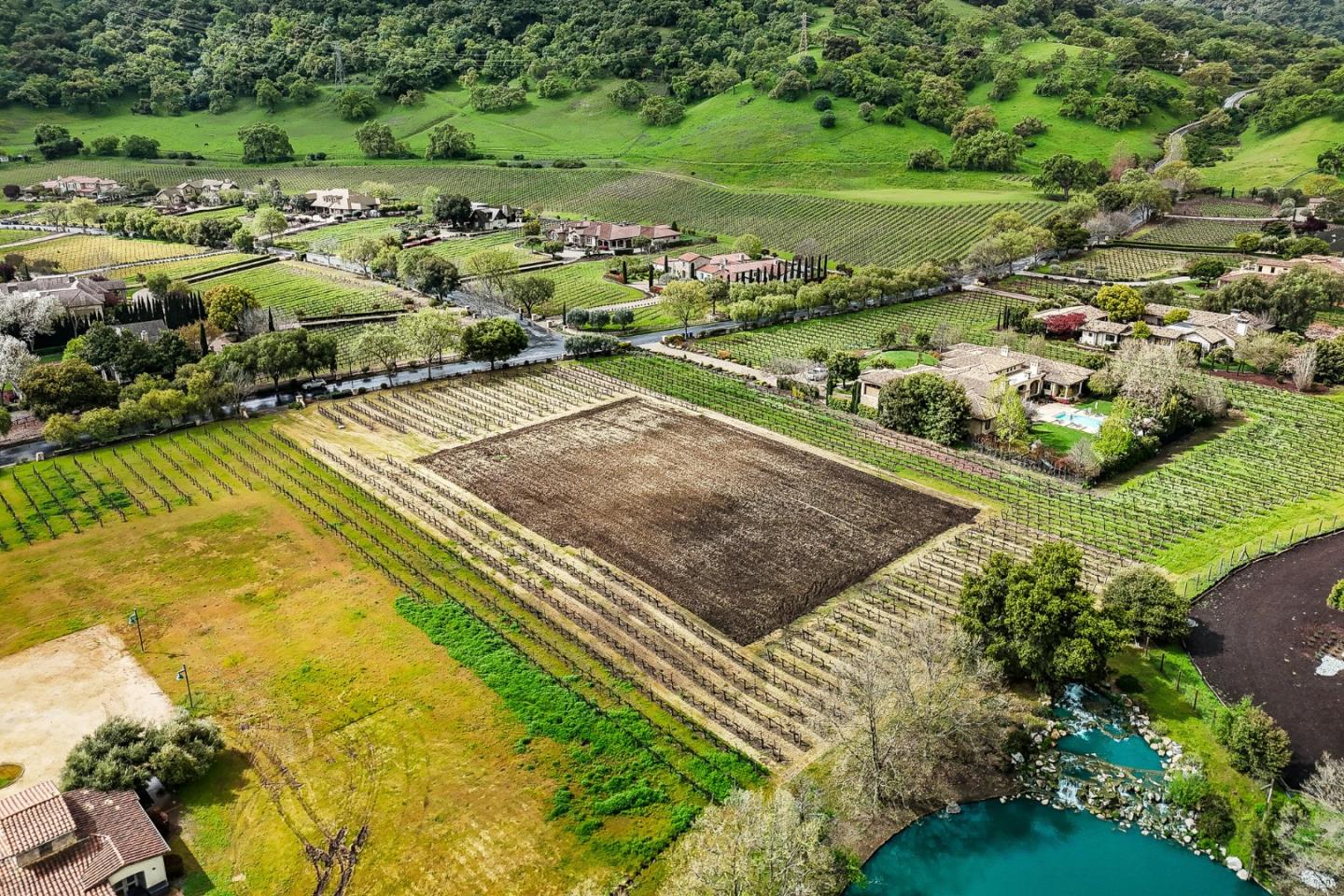 1265 Lions Peak Lane San Martin, CA 95046 - Photo 18 of 29 a view of a golf course with a lake view