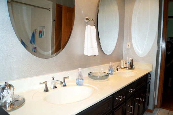 11837 Bend River Road Roscoe, IL 61073 - Photo 15 of 18 a bathroom with a sink and mirror