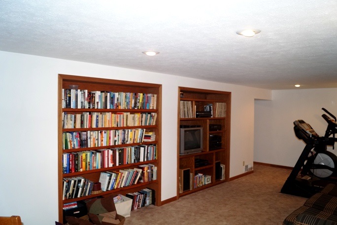 11837 Bend River Road Roscoe, IL 61073 - Photo 18 of 18 a view of a workspace with furniture and closet