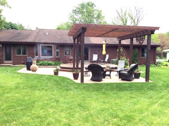11837 Bend River Road Roscoe, IL 61073 - Photo 4 of 18 a view of a house with backyard porch and sitting area