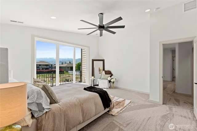 a bed room with a bed and a couch