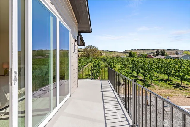 a view of a balcony with an outdoor space
