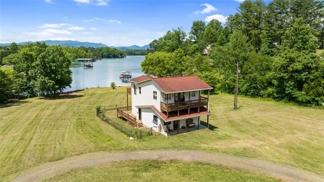 a view of a swimming pool with a lounge chair
