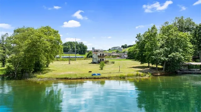 a view of swimming pool with yard