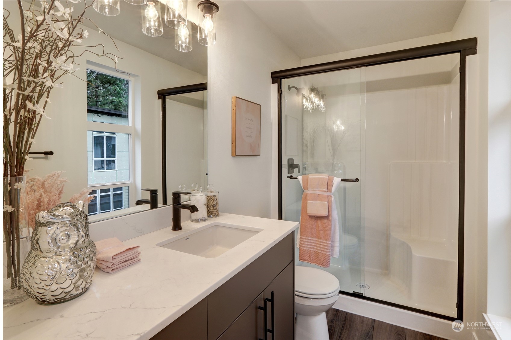 13710 Ash Way, Unit A7 Everett, WA 98204 - Photo 14 of 22 a bathroom with a sink a toilet and shower