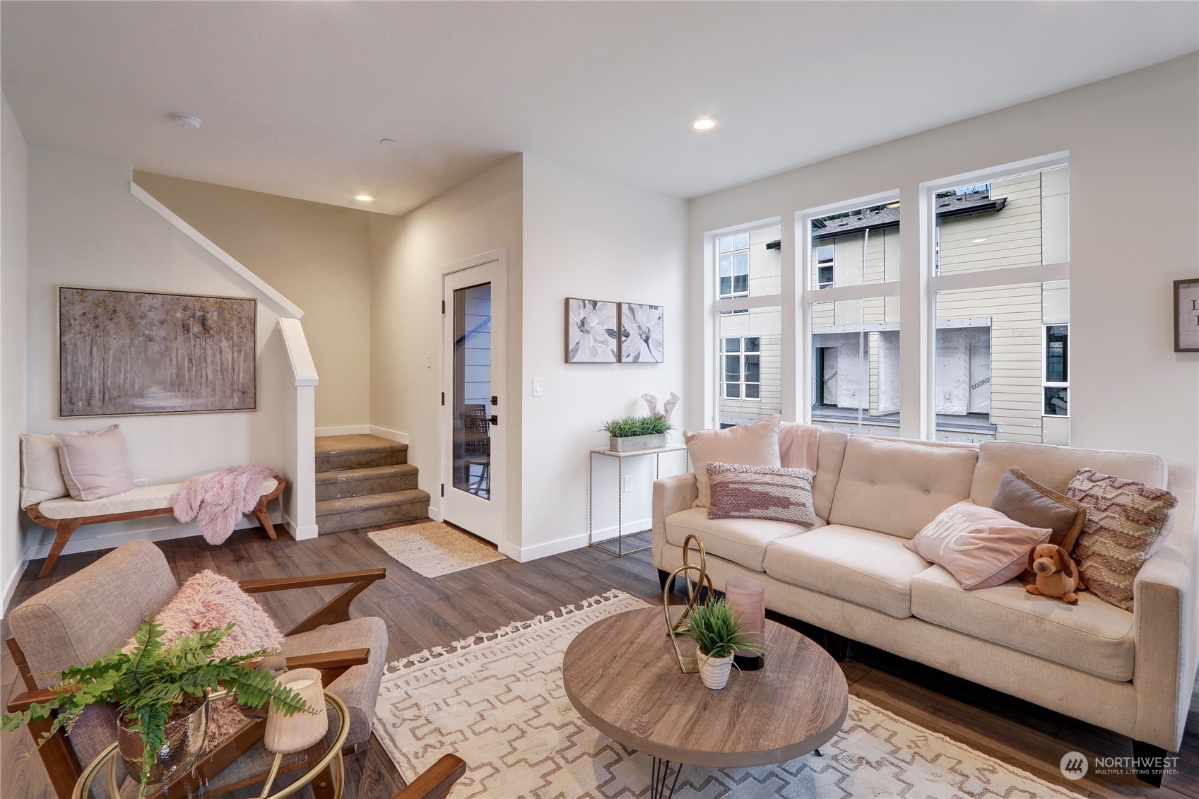 13710 Ash Way, Unit A7 Everett, WA 98204 - Photo 3 of 22 a living room with furniture and a wooden floor